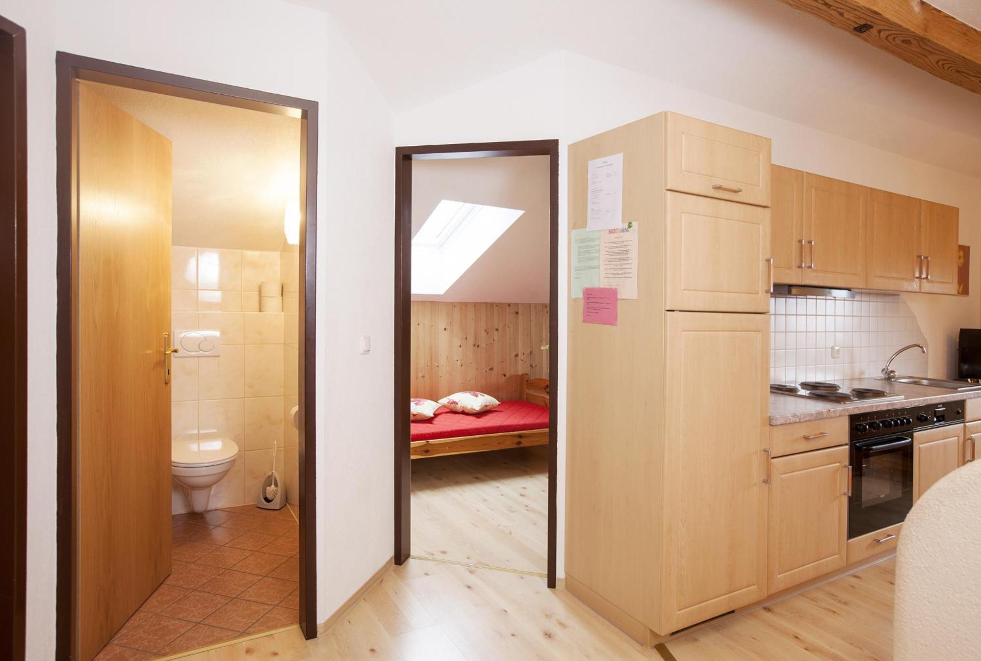 Biobauernhof Schuster Apartment ฮอพฟ์การ์เทน อิม บริกเซนทัล ห้อง รูปภาพ